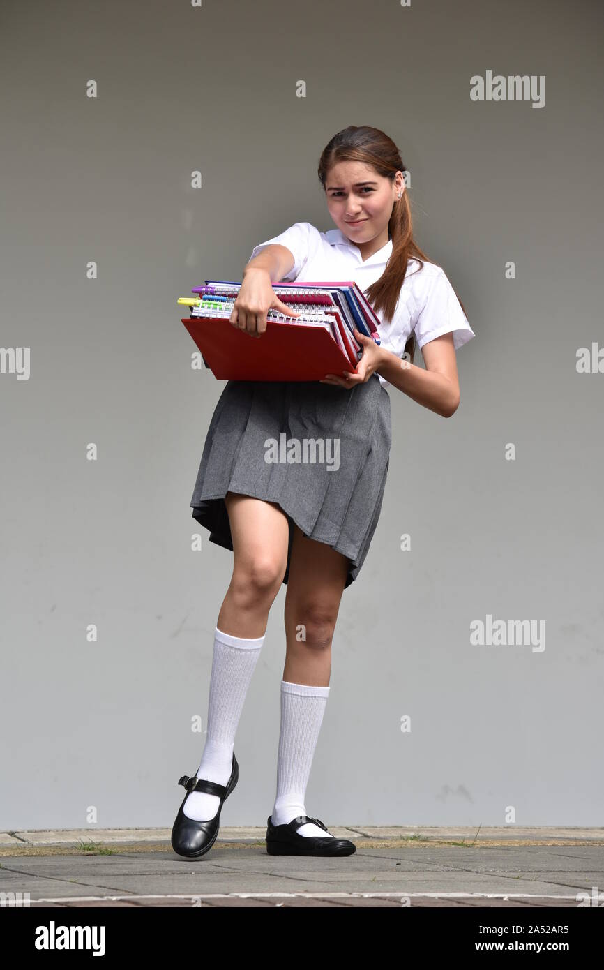 Manhattan Calígrafo caja registradora Linda chica estudiante bajo estrés que lleva una falda mientras está de pie  Fotografía de stock - Alamy