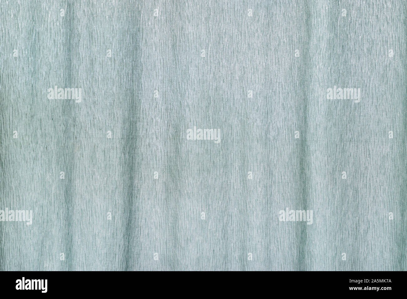 Luz de fondo en tejido de seda de color azul, cortina telón de fondo Foto de stock