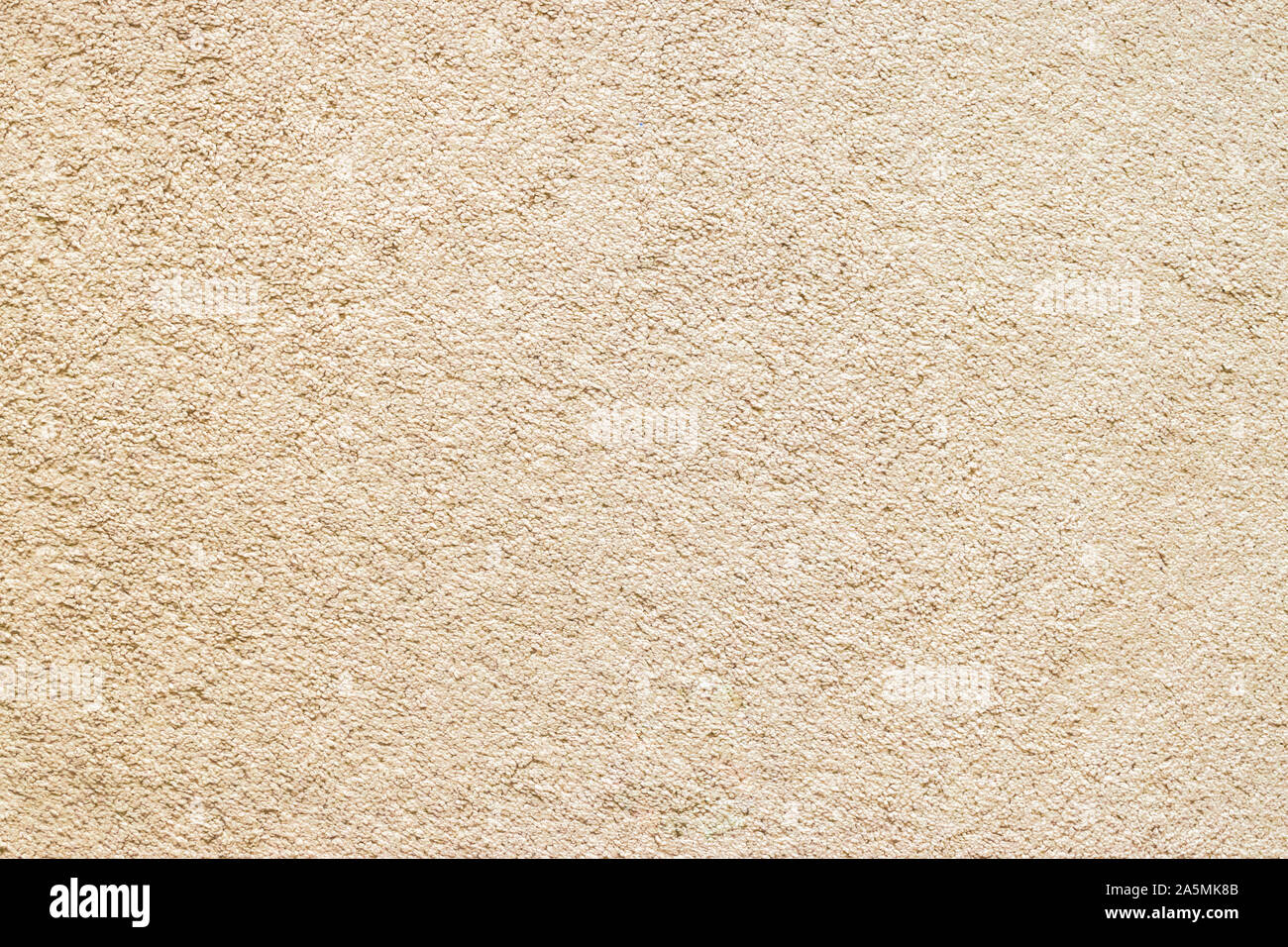 La textura de la alfombra beige, marrón claro de fondo alfombra de piso Foto de stock