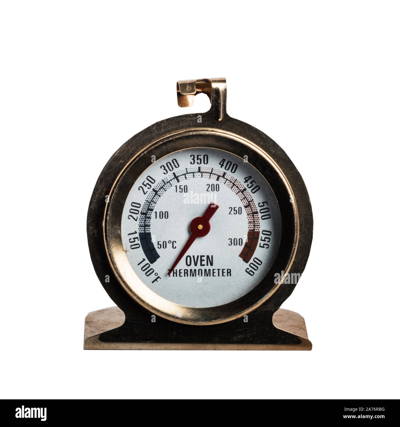 Un termómetro del horno sobre un fondo blanco. Foto de stock