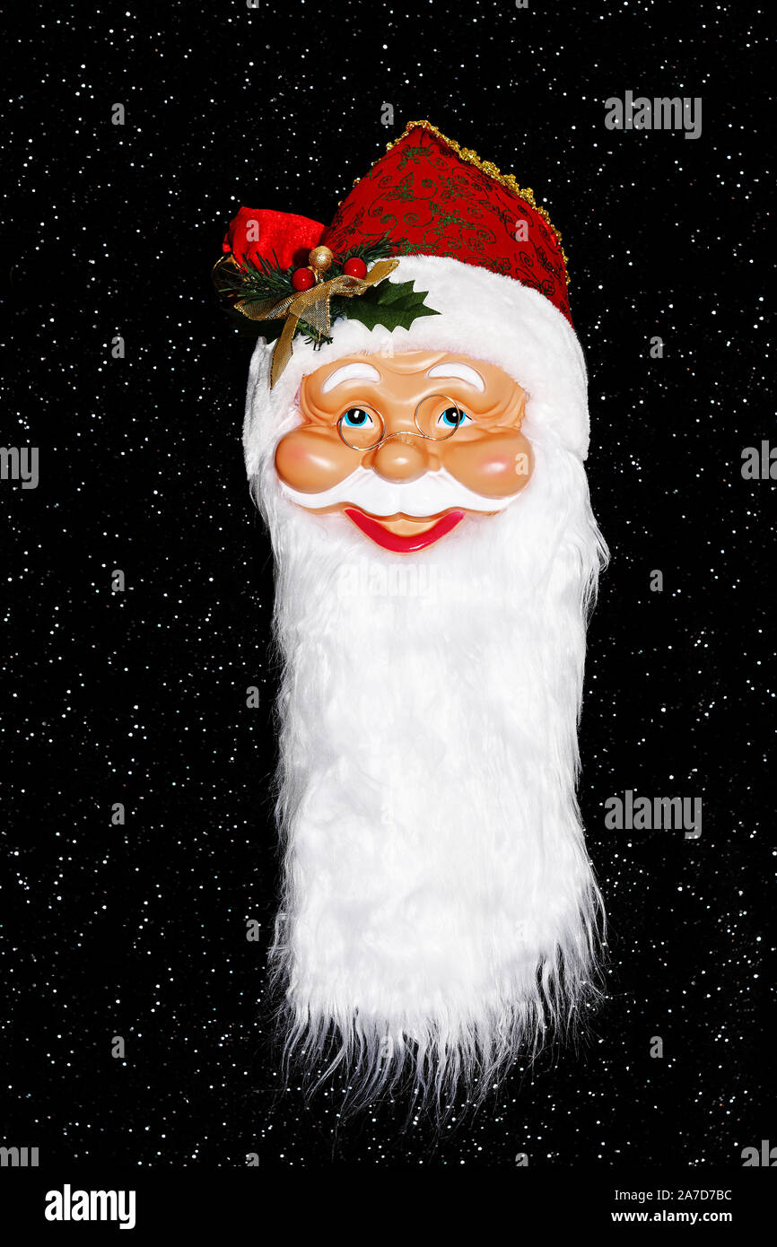 Weihnachtsmann, Santa Claus, Maske, vor Sternenhimmel, Foto de stock