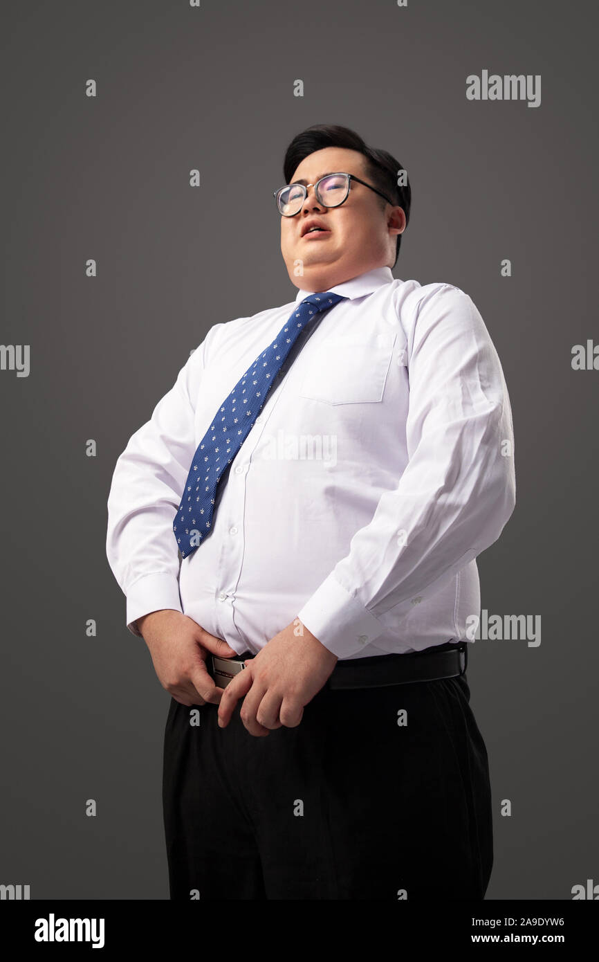 El hombre gordo, vistiendo ropa Fotografía de stock - Alamy
