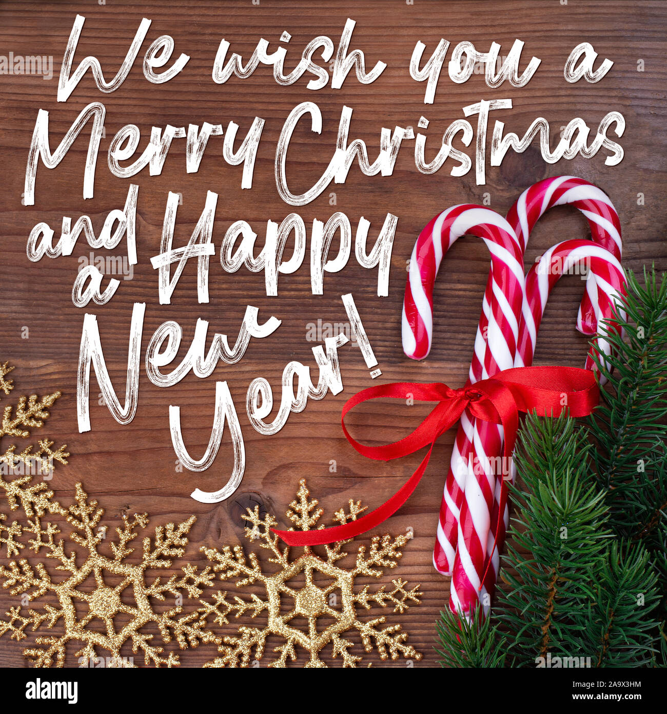 Tarjeta de navidad con saludos en inglés 'Os deseamos una Feliz Navidad y  un feliz año nuevo! Fotografía de stock - Alamy
