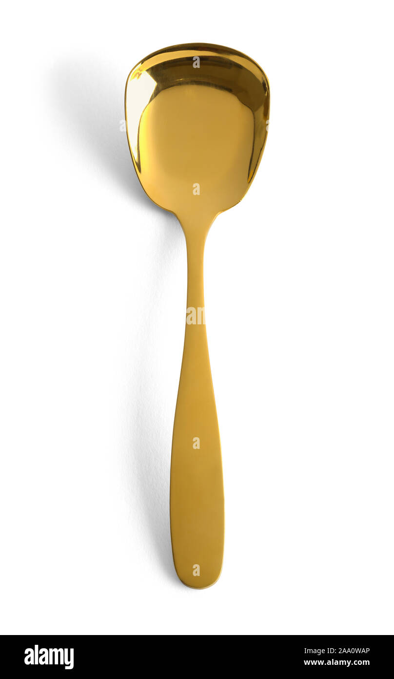 Vista superior de la cuchara de oro aislado sobre fondo blanco. Foto de stock