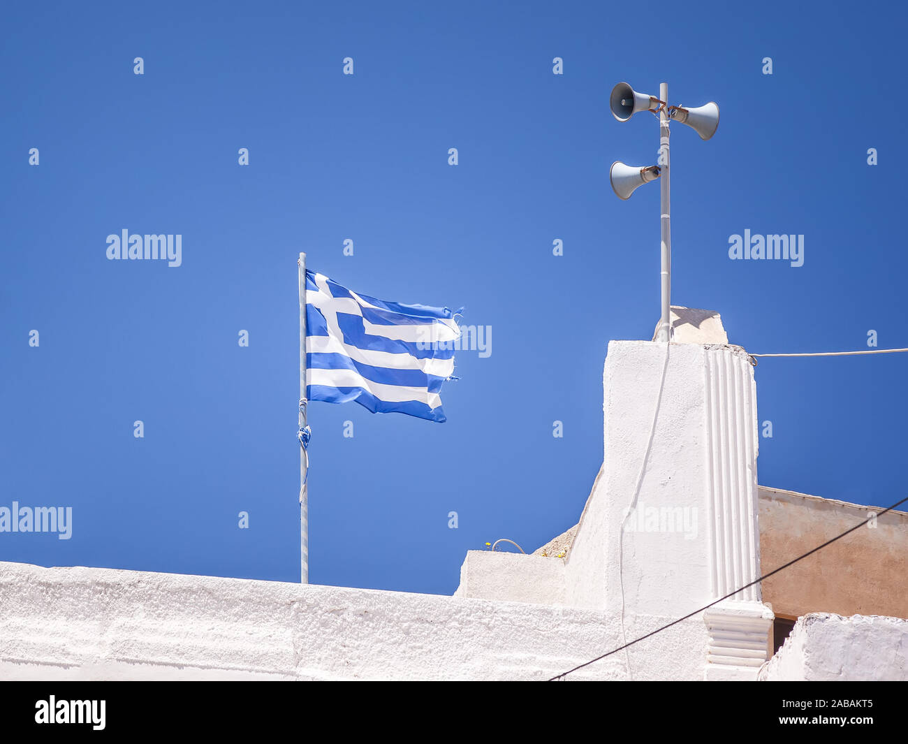 Eine Flagge griechische unter blauem Himmel Foto de stock