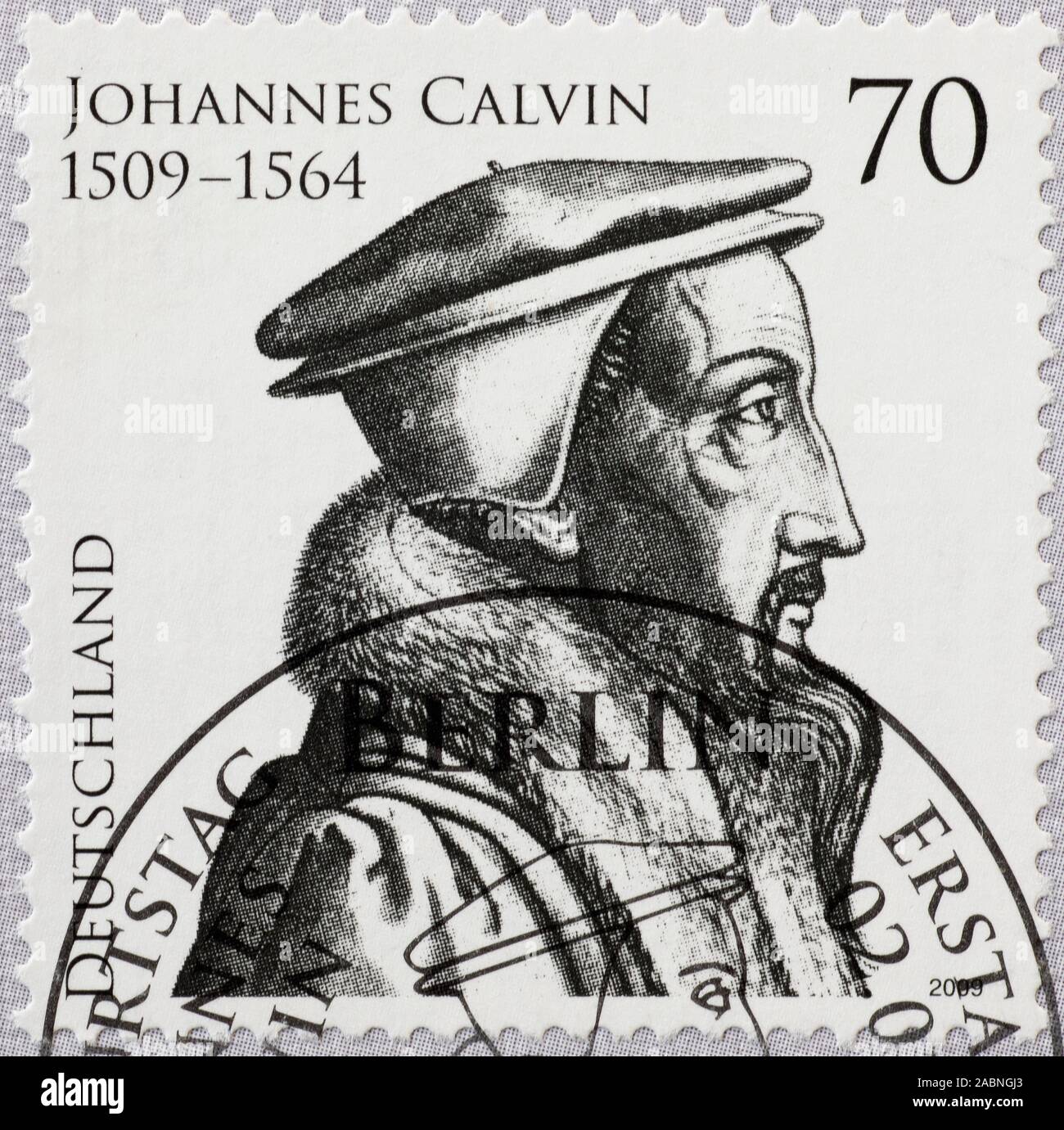 Retrato de Juan Calvino en el sello alemán Foto de stock