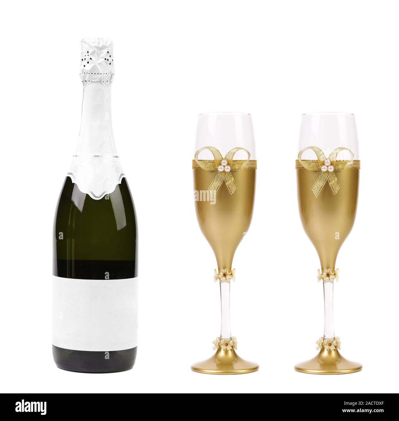 Boda de vidrio dorado wuth bow y champagne. Foto de stock