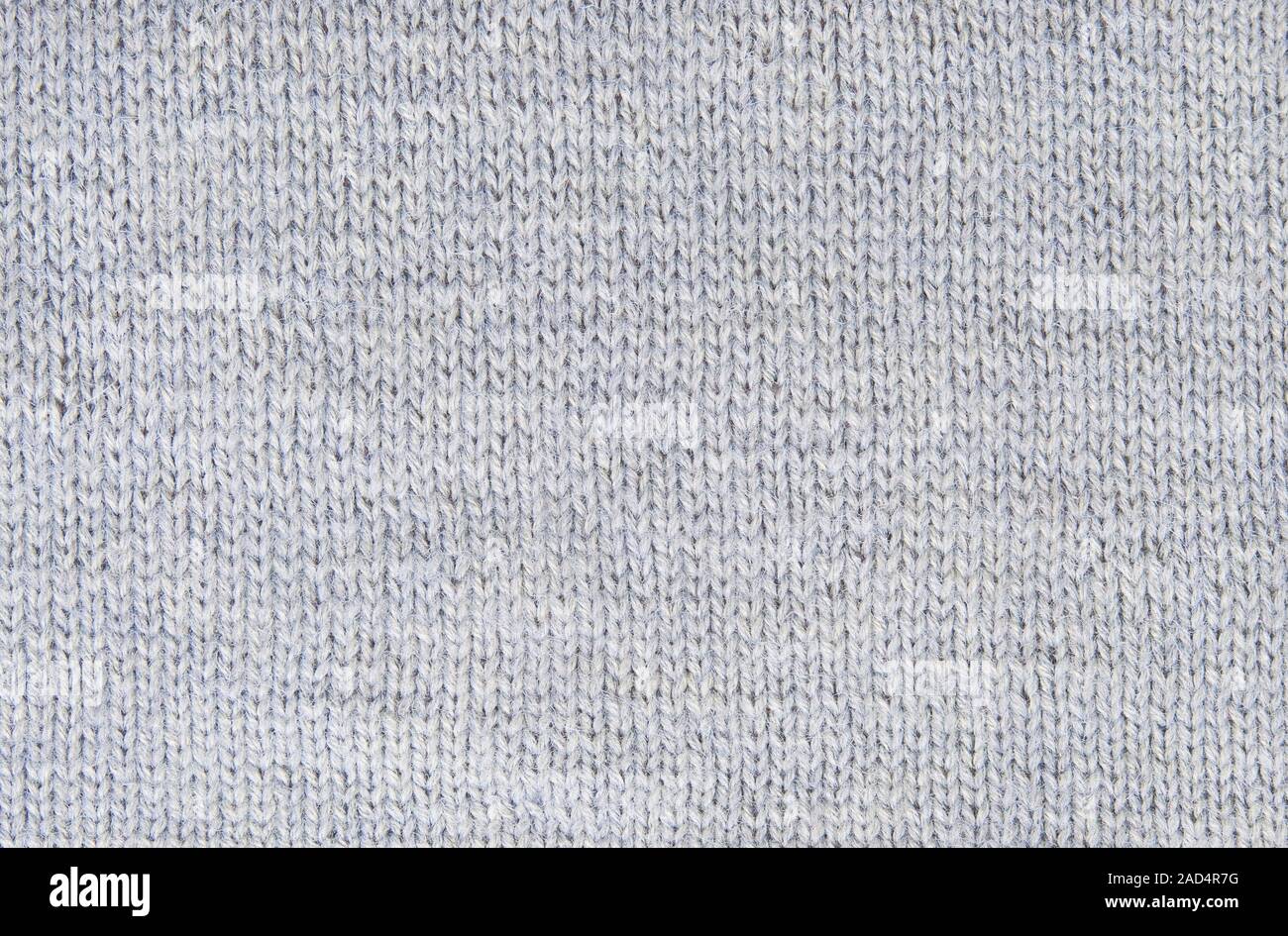Antecedentes patrón pequeño de hilo de tejer lana gris Foto de stock