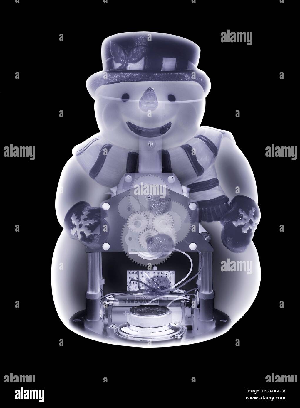 Muñeco de nieve de juguete. X-ray simulado de una novedad muñeco de nieve  de juguete. El mecanismo de engranajes y electrónica dentro del juguete  hace que se reproduzca música y movimiento Fotografía