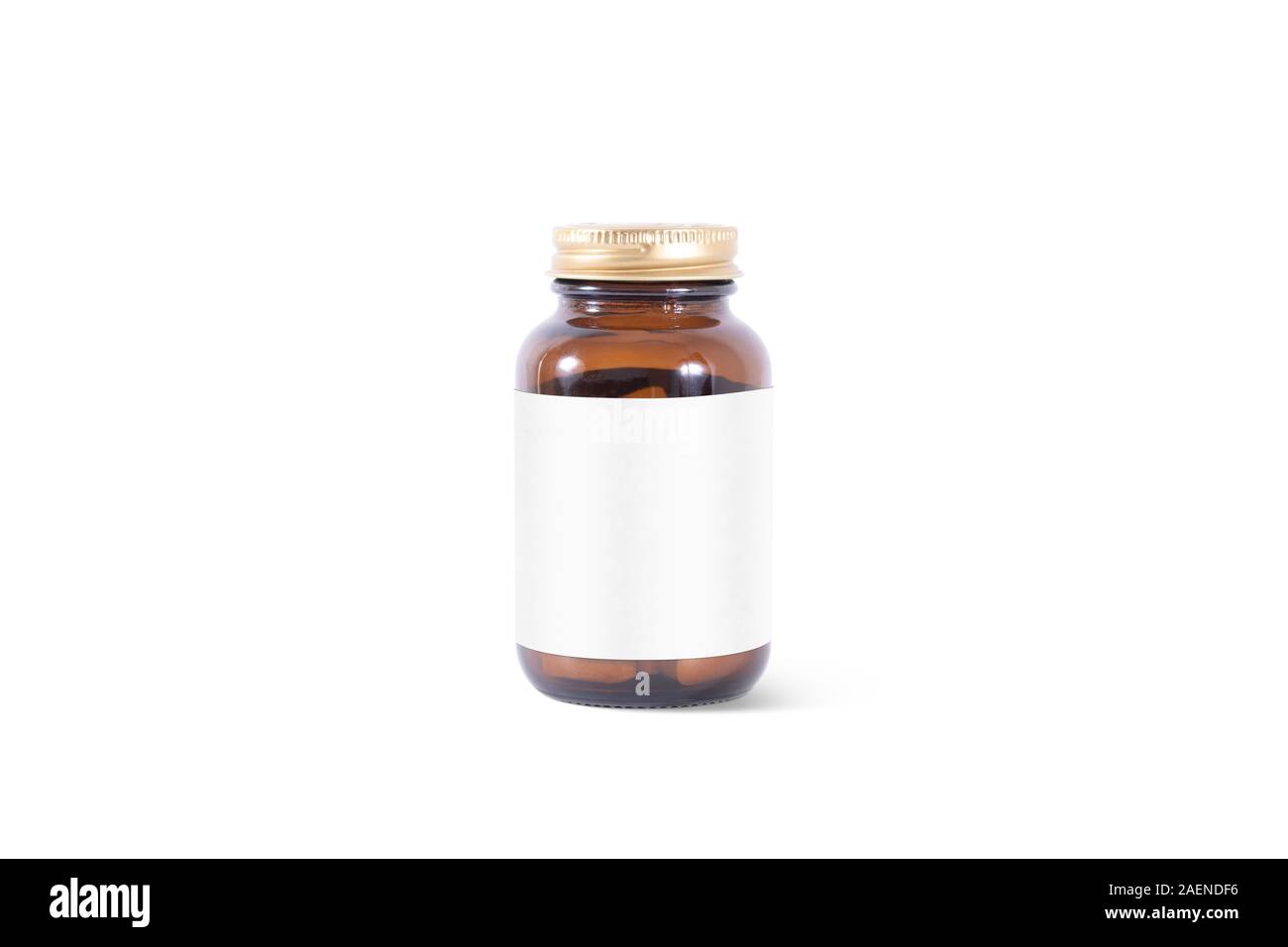 La píldora de vidrio ámbar en blanco puede con la etiqueta blanca de mascup, aislado Foto de stock
