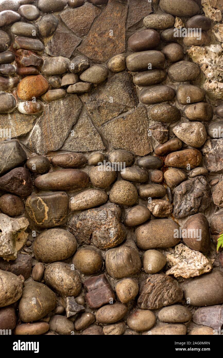 Muro de Piedra de empedrado cubierto con barniz Fotografía de stock - Alamy