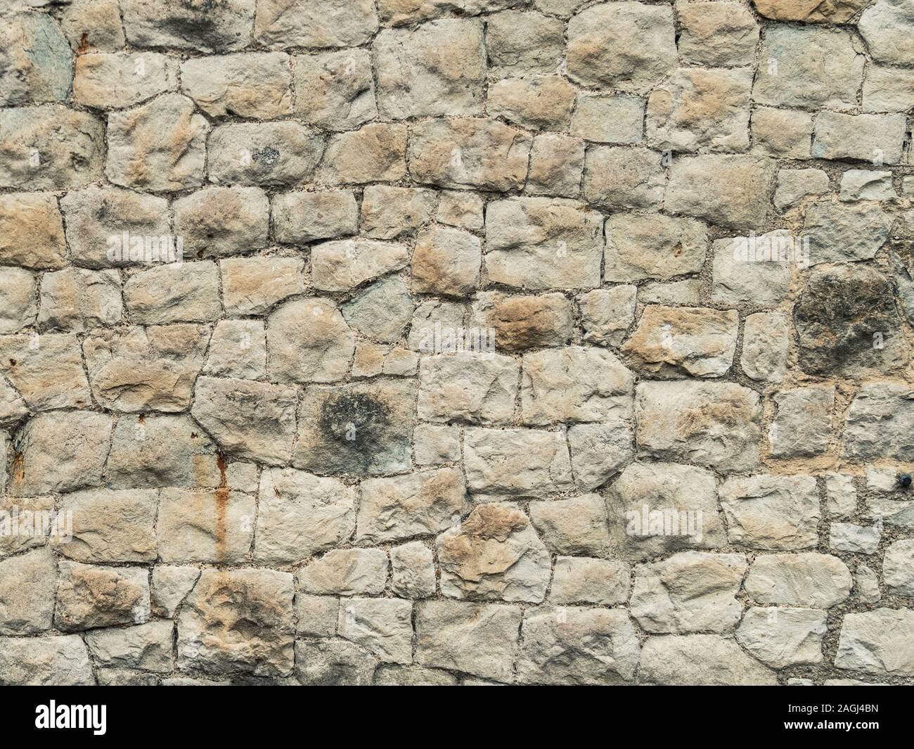 El antiguo muro de piedra. Textura de pared de piedra natural. Foto de stock