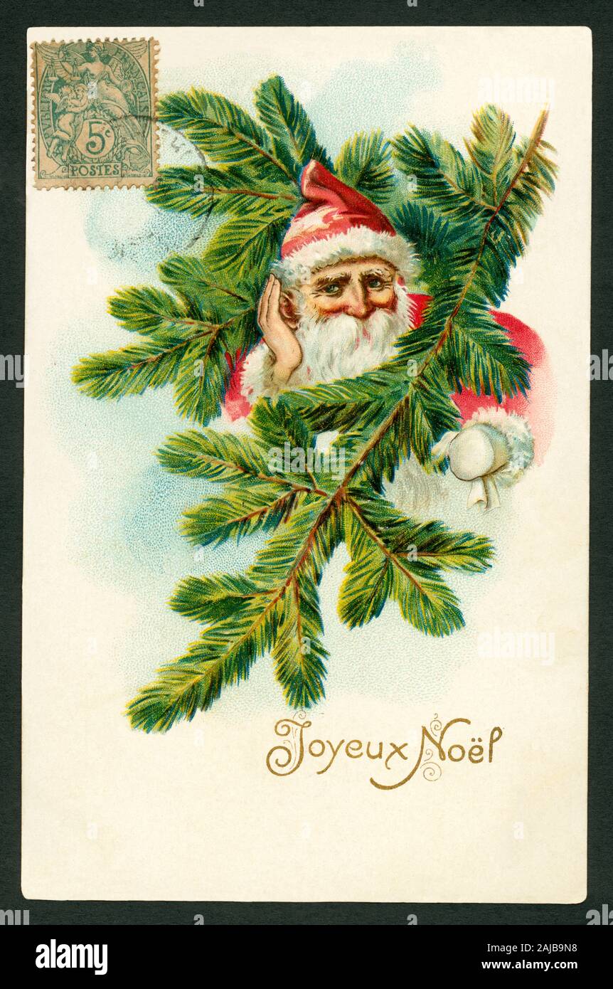 Europa, Frankreich, französische Weihnachtskarte mit dem Texto ' Joyeux Noel ' ( Fröhliche Weihnachten ) , der Weihnachtsmann schaut durch Tannenzweige wurde verschickt hindurch, 1909 . / Europa, Francia, Francés Tarjeta de Navidad con el texto "Joyeux Noel ' ( Feliz Navidad ) , padre de Navidad viendo a través de algunas ramas de abeto, envió 1909 . Foto de stock