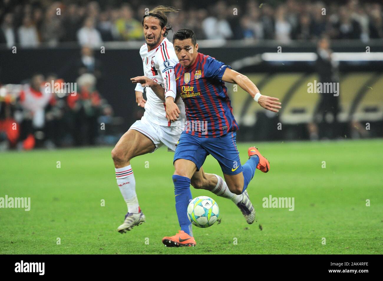 Milán, Italia 28/03/2012, 'Giuseppe Meazza' Stadium, Champions League 2011/ 2012 , AC.Milan - FC Barcelona coinciden: Alexis Sánchez en acción durante el partido Foto de stock