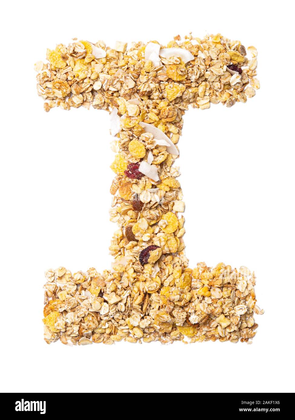 Letra I del alfabeto inglés muesli con coco, bayas, pasas, cereales y
