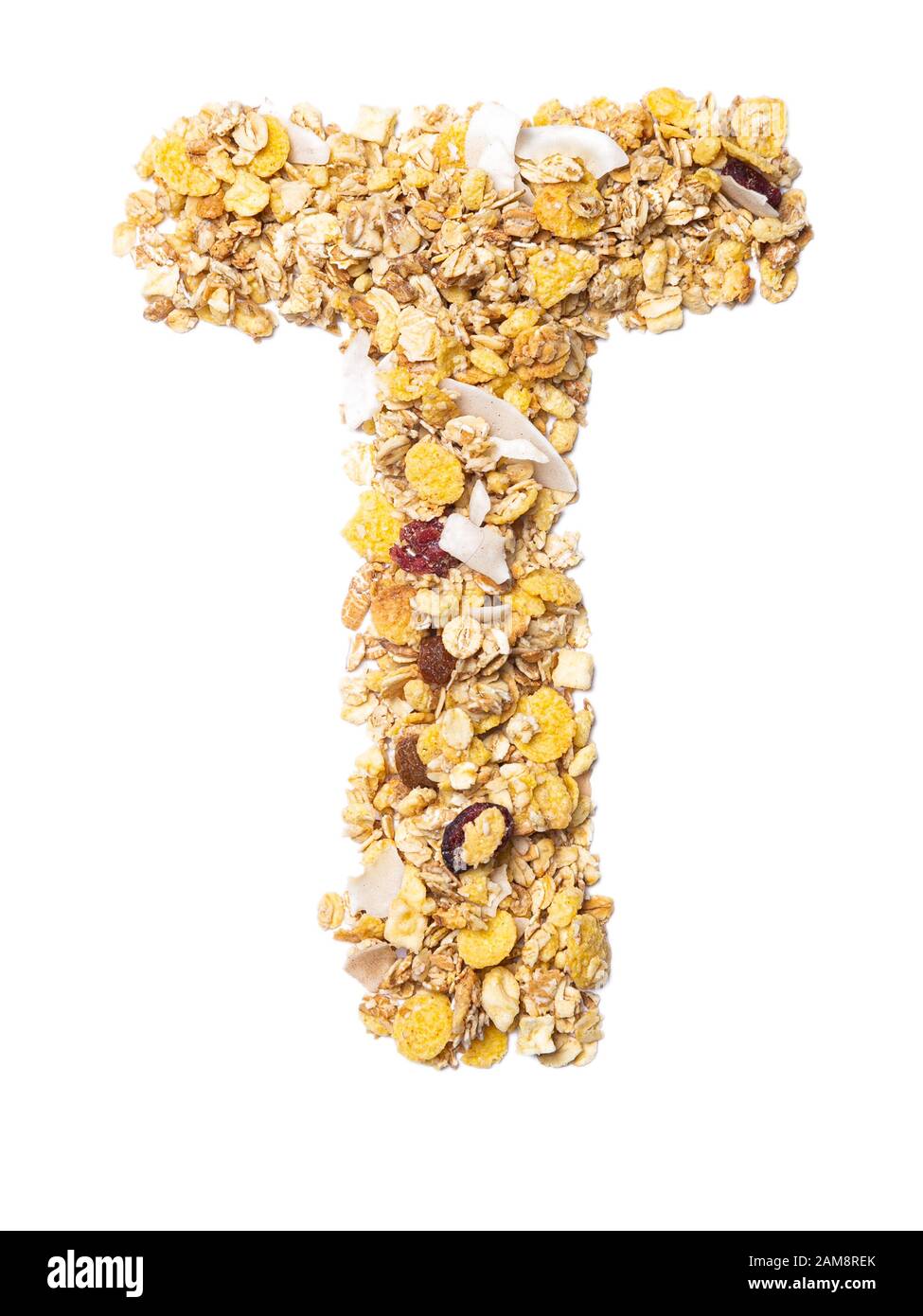 Letra T del alfabeto inglés muesli con coco, bayas, pasas, cereales y