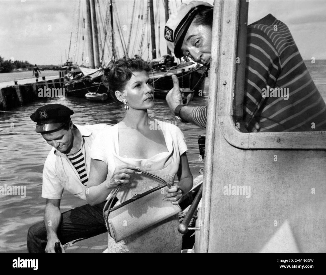 LEMMON, HAYWORTH, MITCHUM, FUEGO ABAJO, 1957 Foto de stock