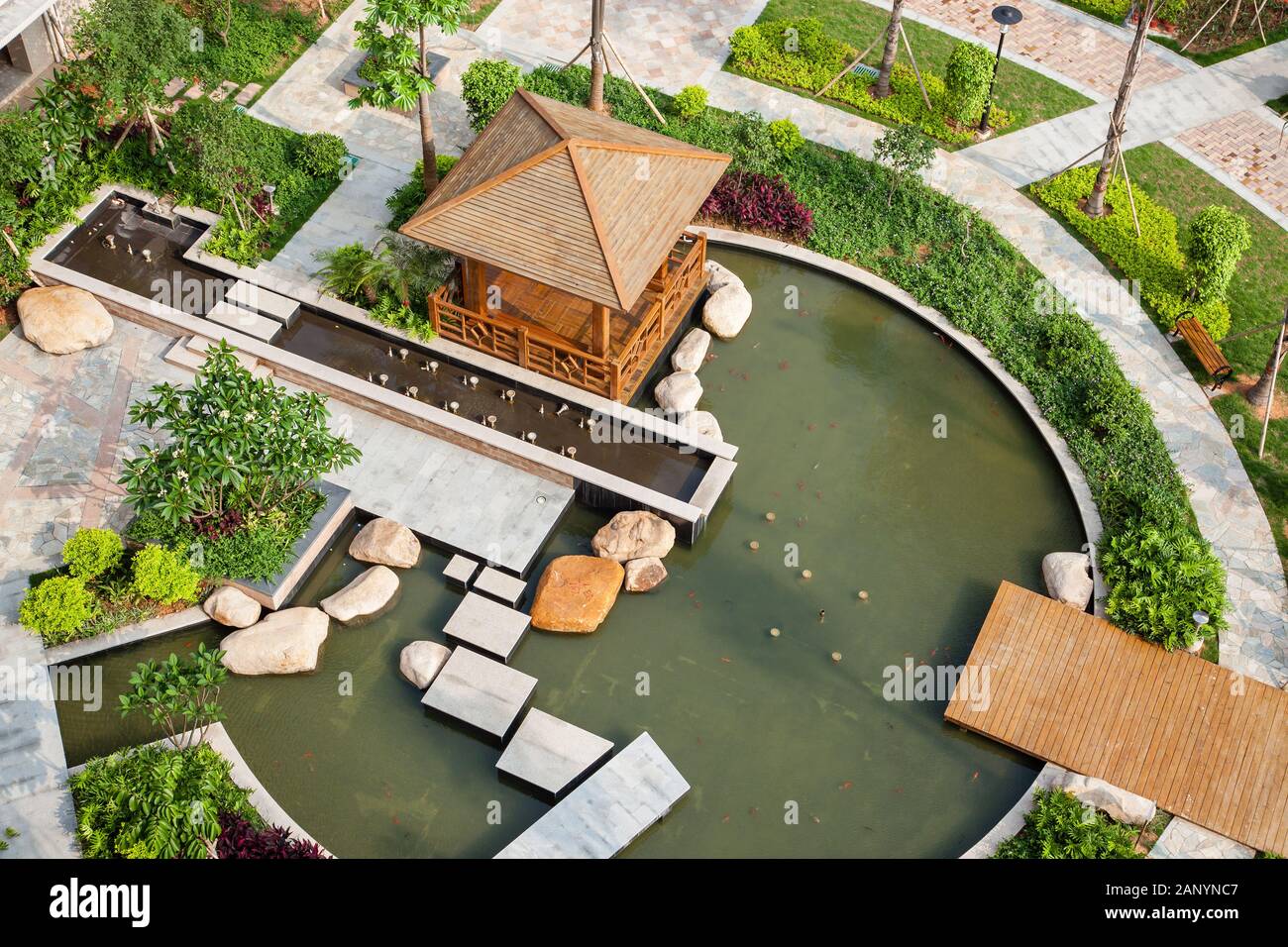 Maqueta de una casa con jardin y piscina 