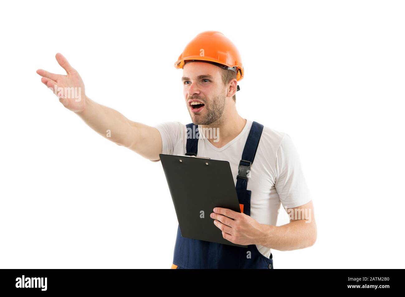 Supervisor de obra. Trabajador de la construcción aislado en blanco.  Gerente de construcción. Maestro constructor. Ingeniero de edificios. El  ingeniero de construcción o constructor usan casco protector y ropa de  trabajo Fotografía