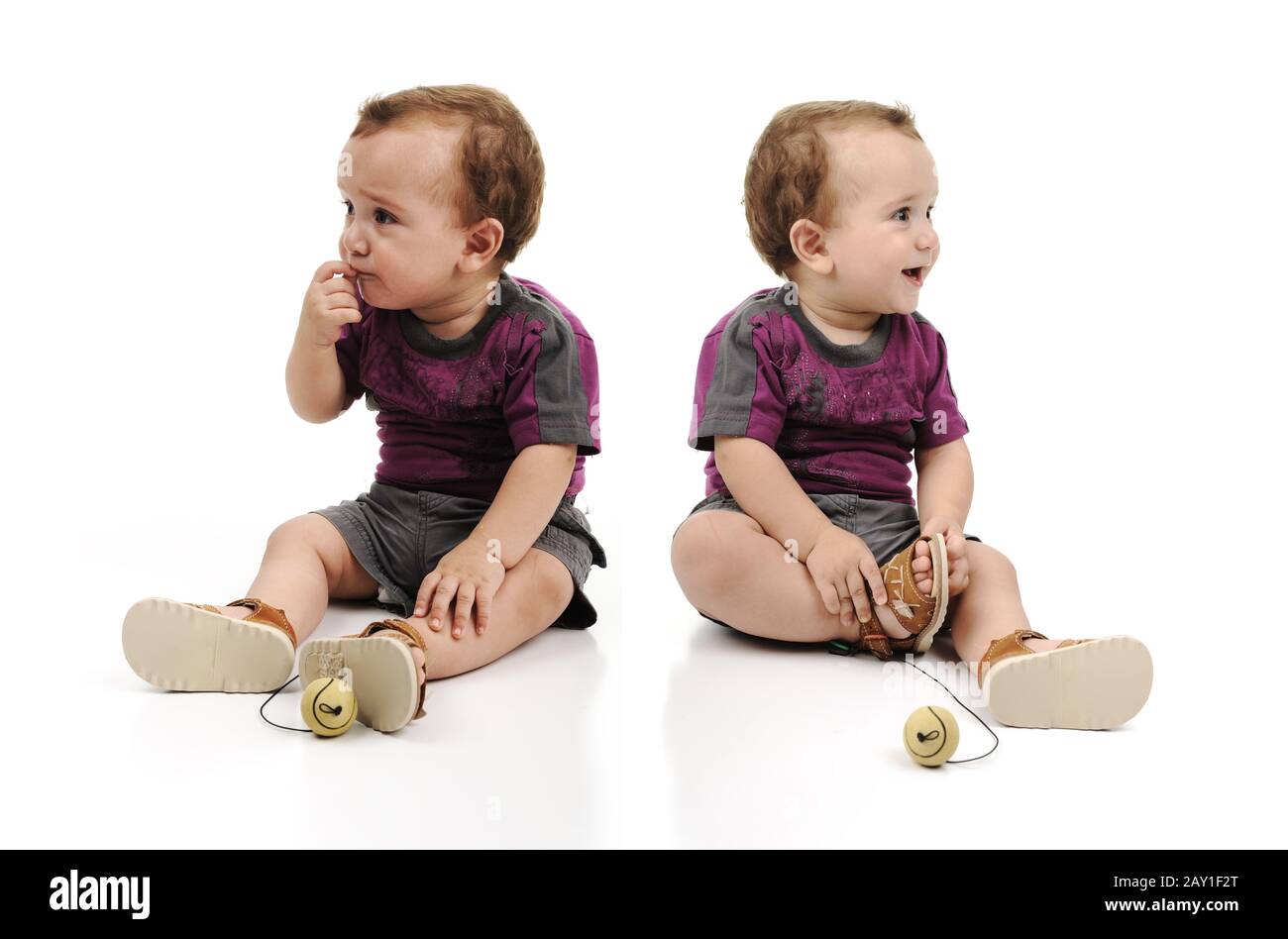 Los Ninos Gemelos Estan Sentados Juntos Un Bebe Esta Enojado Triste Llorando Y Otro Es Feliz Disparo De Estudio Fotografia De Stock Alamy
