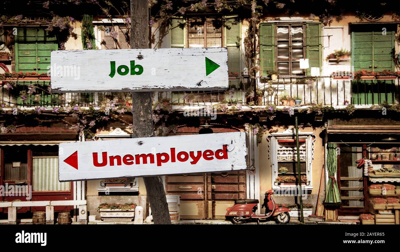 Calle Signo de trabajo frente a desempleados Foto de stock