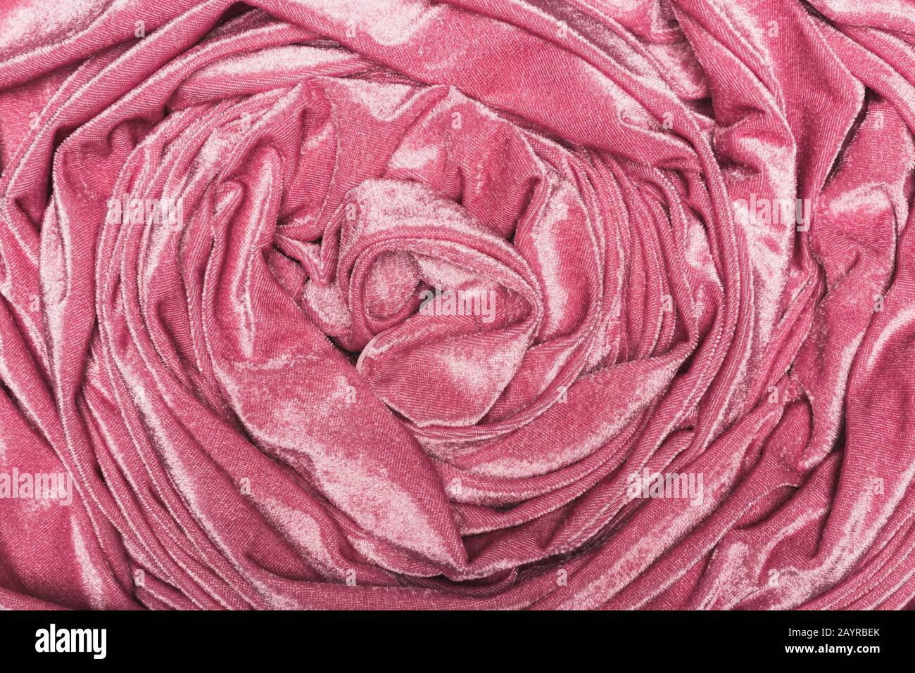 Vista superior del fondo de tela de terciopelo rosa torcido Fotografía de  stock - Alamy