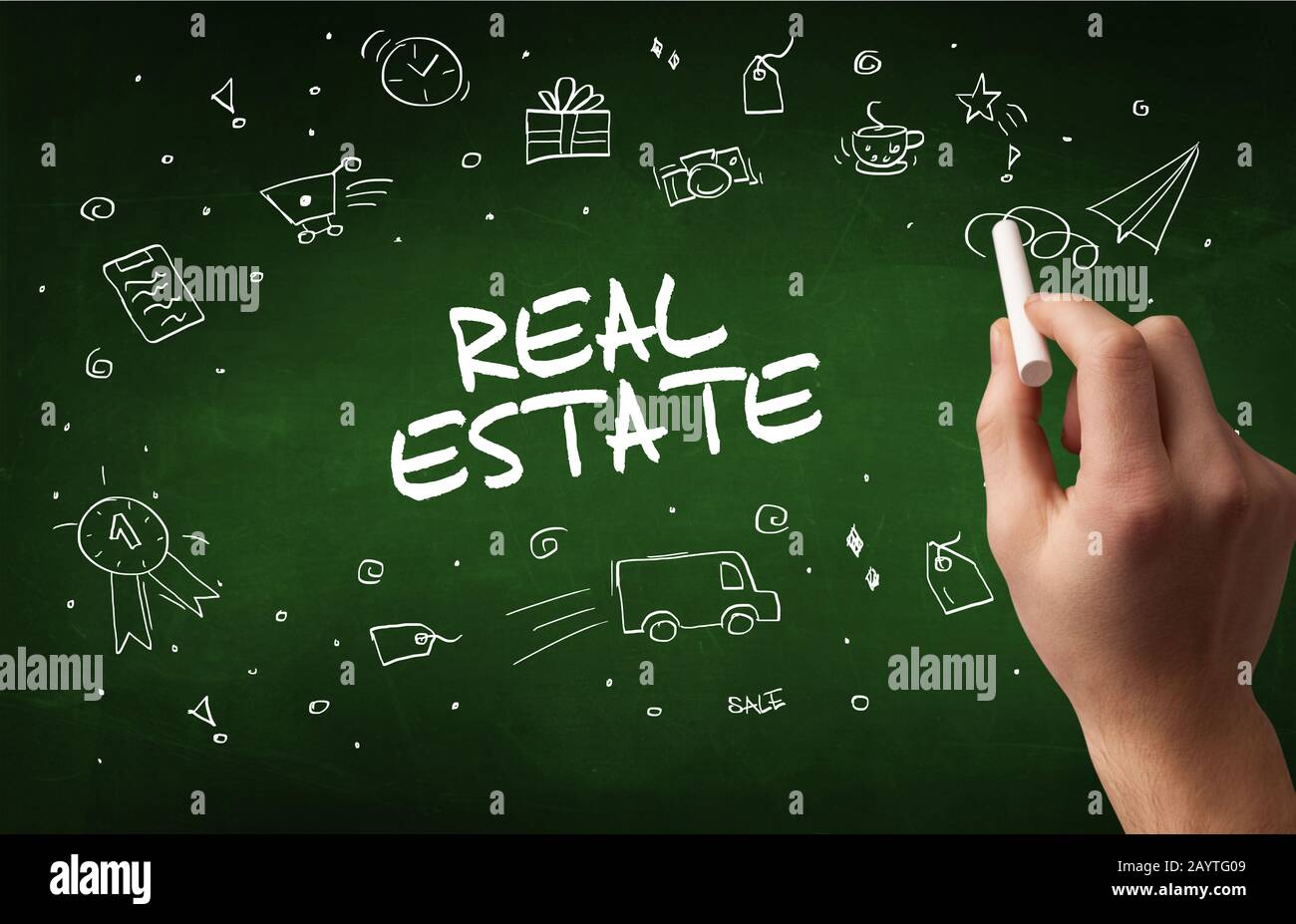 Dibujo a mano alzada, REAL ESTATE inscripción con tiza blanca sobre la