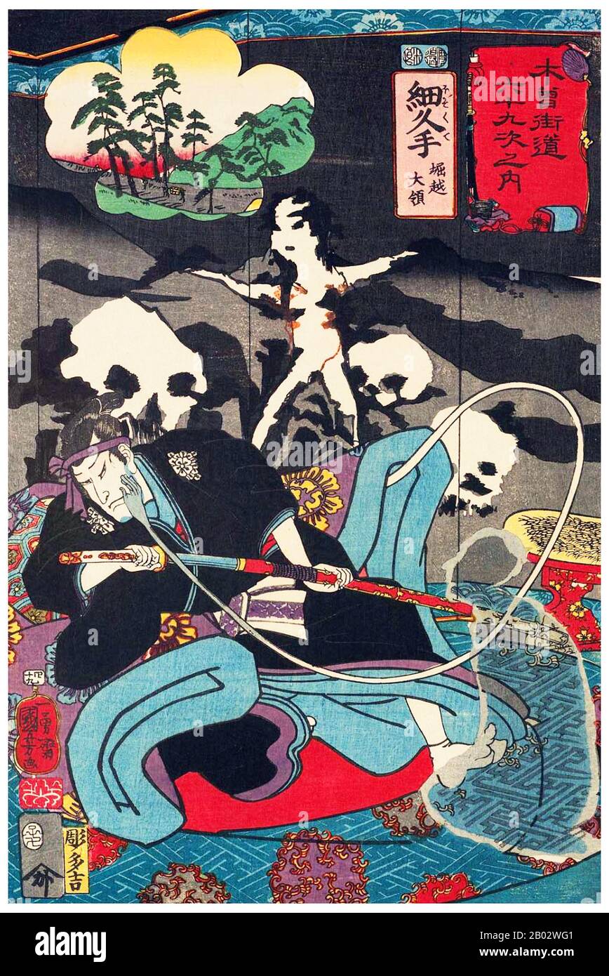 Utagawa Kuniyoshi (1 de enero de 1798 - 14 de abril de 1861) fue uno de los últimos grandes maestros del estilo ukiyo-e japonés de grabados y pintura en bloque de madera. Está asociado con la escuela de Utagawa. La gama de temas preferidos de Kuniyoshi incluía muchos géneros: Paisajes, hermosas mujeres, actores Kabuki, gatos y animales míticos. Es conocido por las representaciones de las batallas de samurai y héroes legendarios. Su obra de arte fue afectada por influencias occidentales en la pintura del paisaje y la caricatura. La Nakasendō (Ruta Central de la Montaña), también llamada Kisokaidō, fue una de las cinco rutas del Edo pe Foto de stock