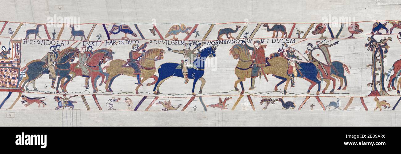Bayeux Tapestry escena 13 : Guy de Ponthieu, a la izquierda, le da a Harold a William el Conquistador, a la derecha. BYX13 Foto de stock