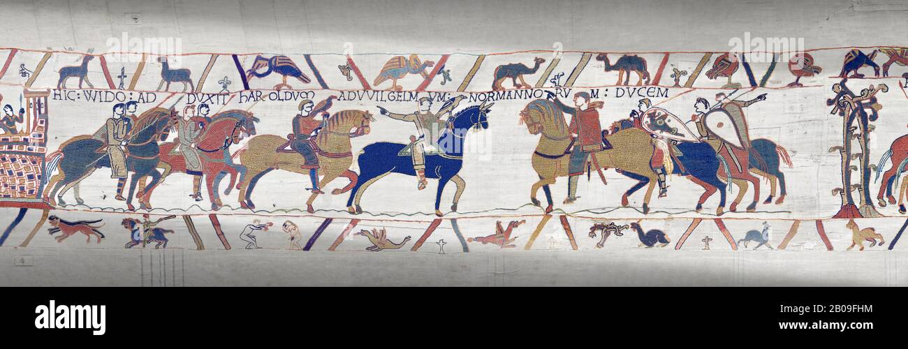 Bayeux Tapestry escena 13 : Guy de Ponthieu, a la izquierda, le da a Harold a William el Conquistador, a la derecha. Foto de stock