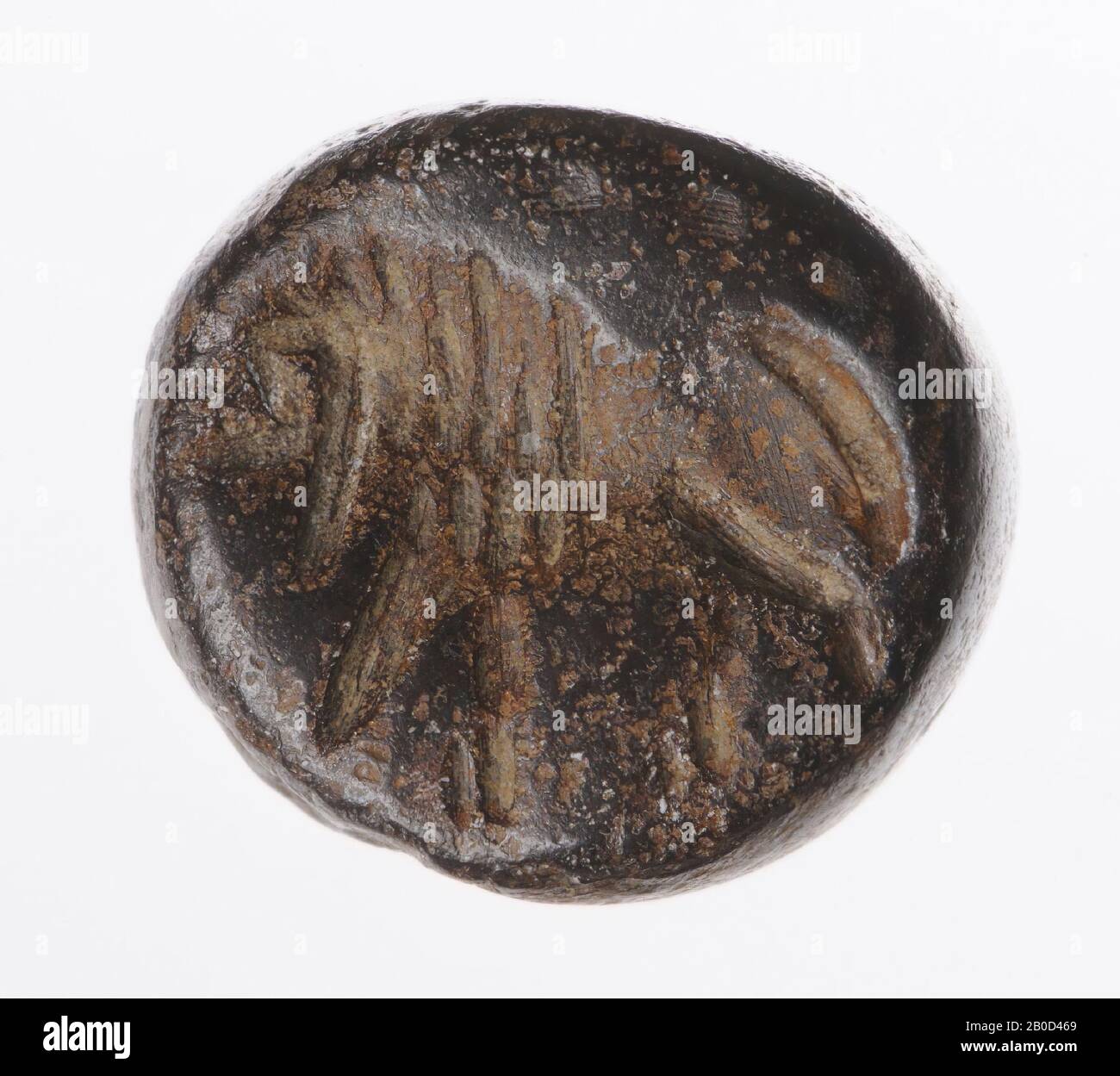 León caminando a la derecha, sello, goetita, Color :, forma: Dactyloid, procesamiento:, Método:, 10.6 x 12.9 x 11.6 mm Foto de stock