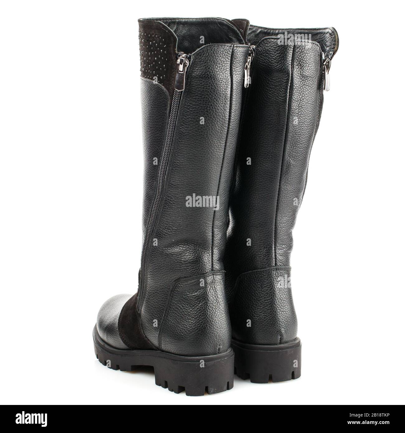 Botas altas negras para niños con inserciones de ante para chicas aisladas  sobre blanco. Vista trasera Fotografía de stock - Alamy