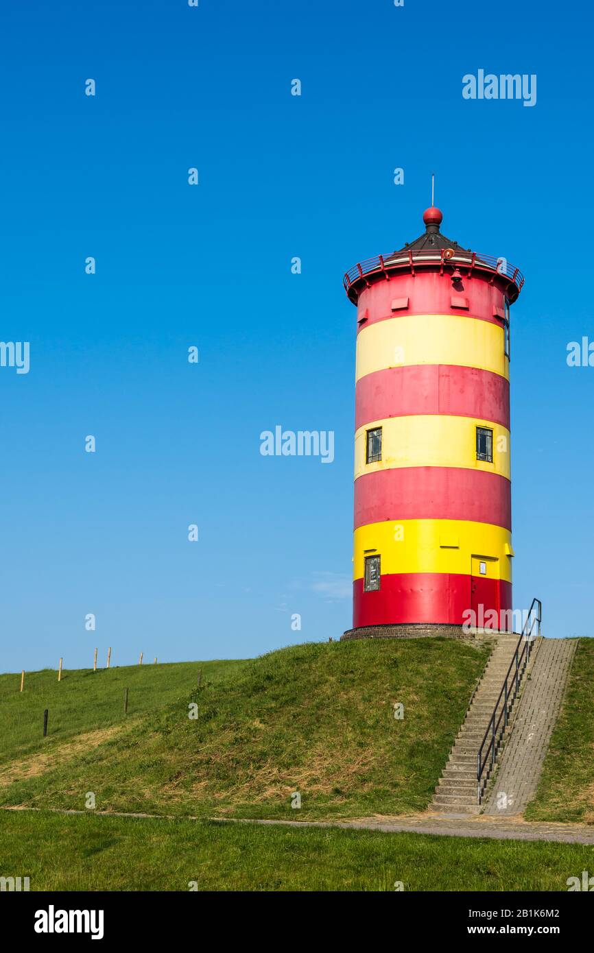 Faro de Pilsum, Pilsum, Krummhoern, Frisia Oriental, Baja Sajonia, Alemania Foto de stock