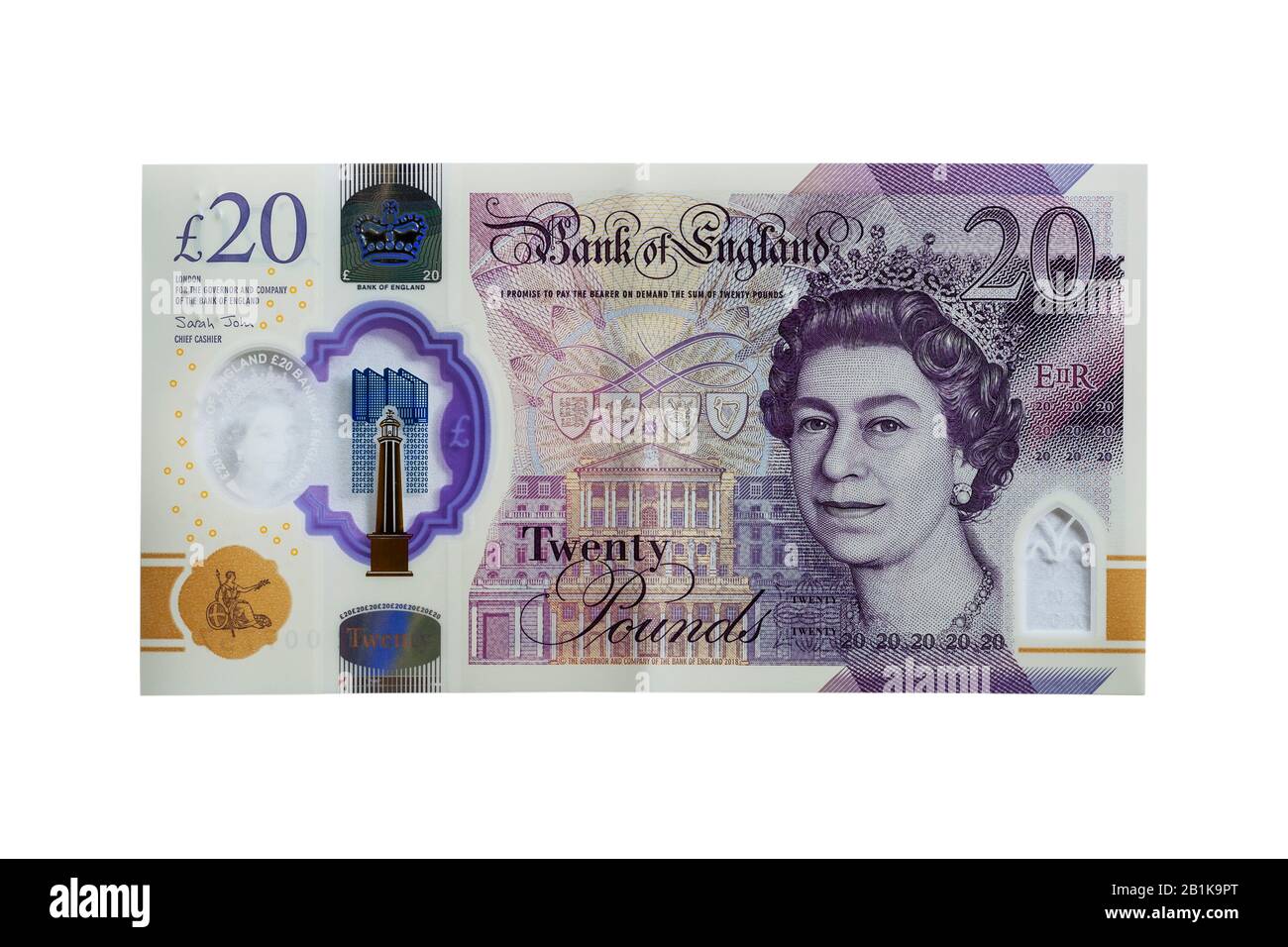 Una nueva nota plástica de 20 libras sobre un fondo blanco Foto de stock