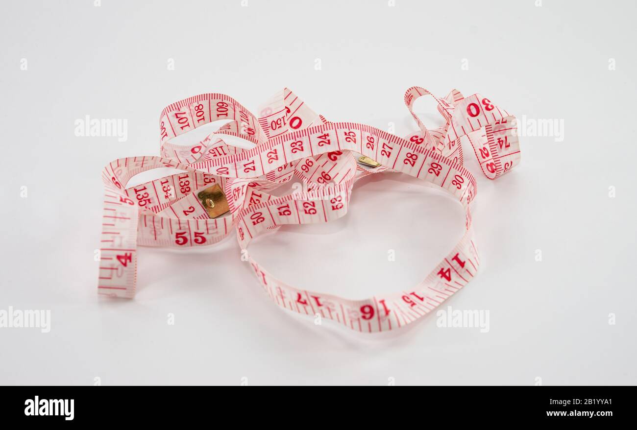 cinta métrica para ropa, metro en centímetros y decímetros, rojo Fotografía  de stock - Alamy