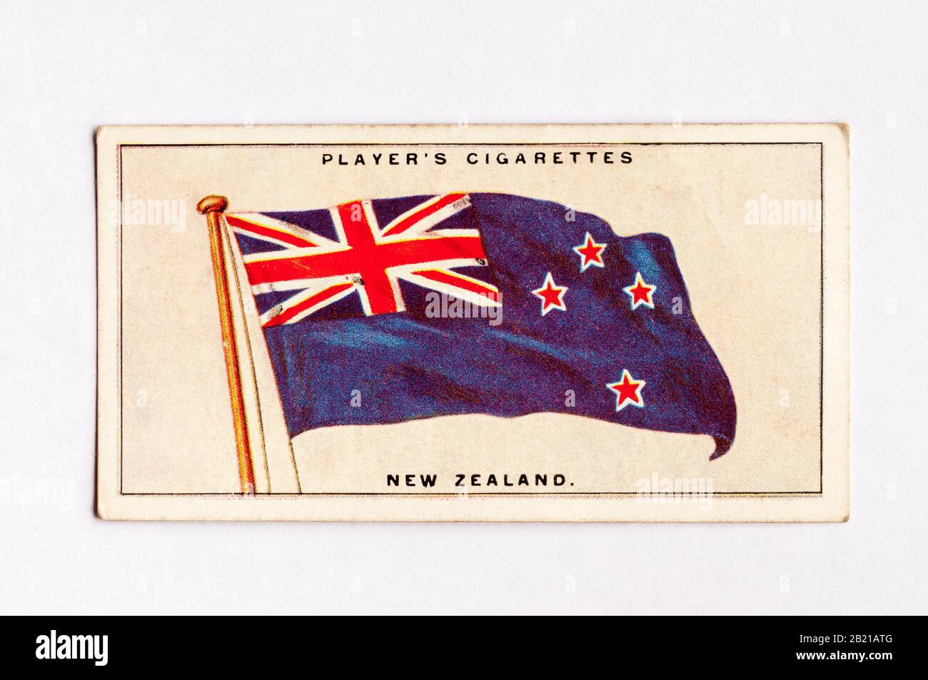 La tarjeta de cigarrillos del jugador en la serie de Banderas de la Liga de las Naciones muestra la bandera de Nueva Zelanda. Publicado En 1928. Foto de stock