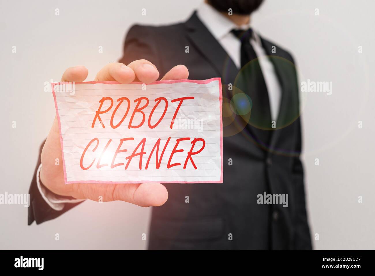 Nota de escritura que muestra el limpiador de robots. Concepto de negocio para la programación inteligente y un sistema de limpieza de vacío limitado Hombre ropa de trabajo formal Foto de stock