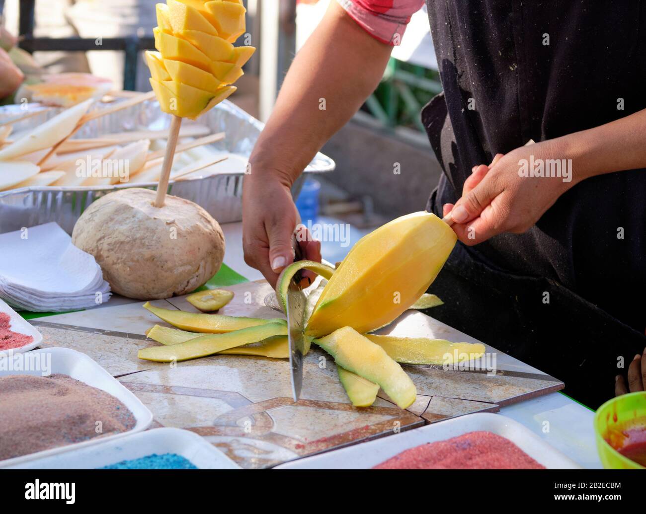 Mango en un palo fotografías e imágenes de alta resolución - Alamy