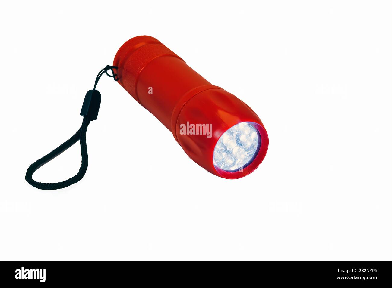 Linterna LED portátil de color rojo aislado sobre fondo blanco. Foto de stock