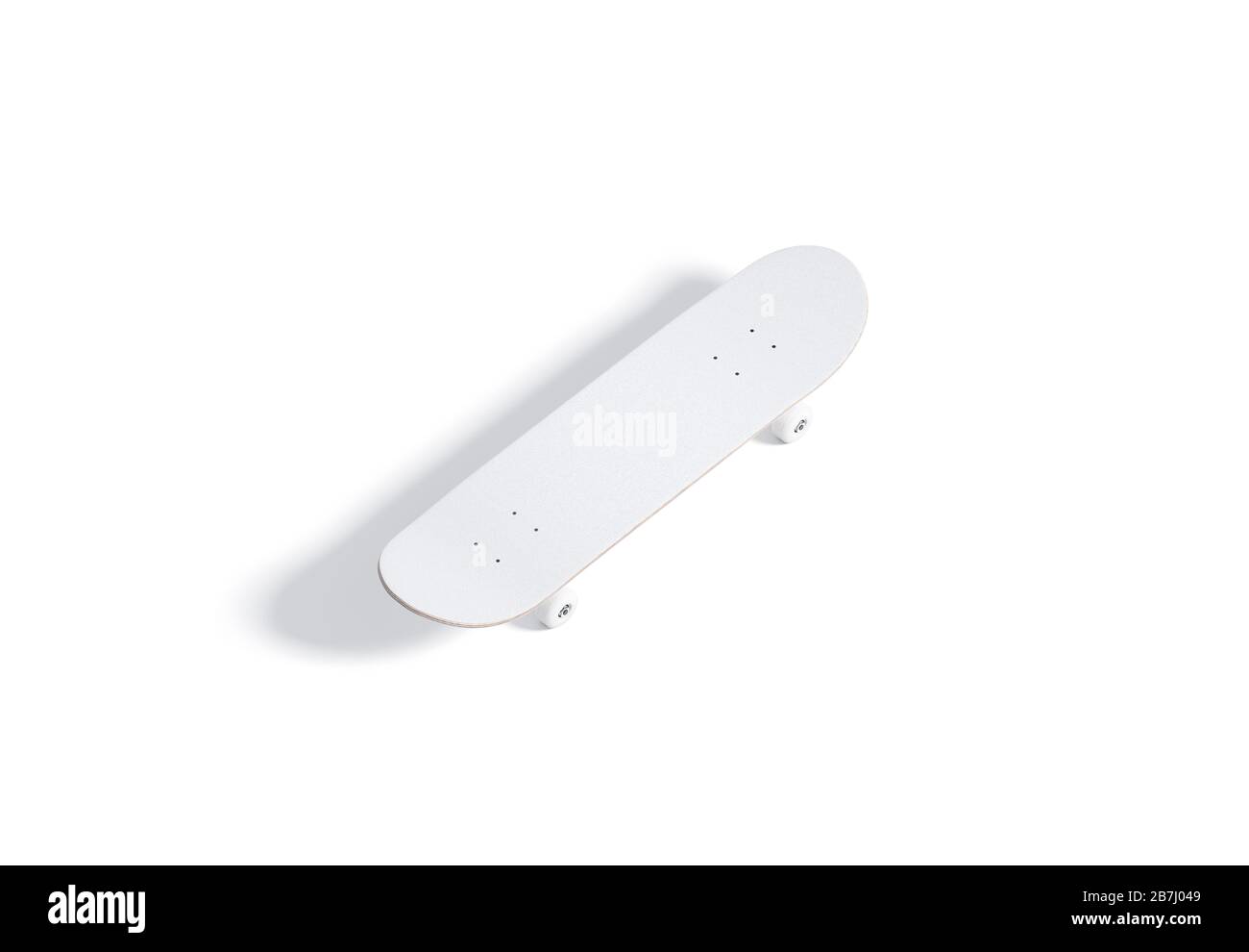 Skateboard blanco en madera, vista superior Foto de stock