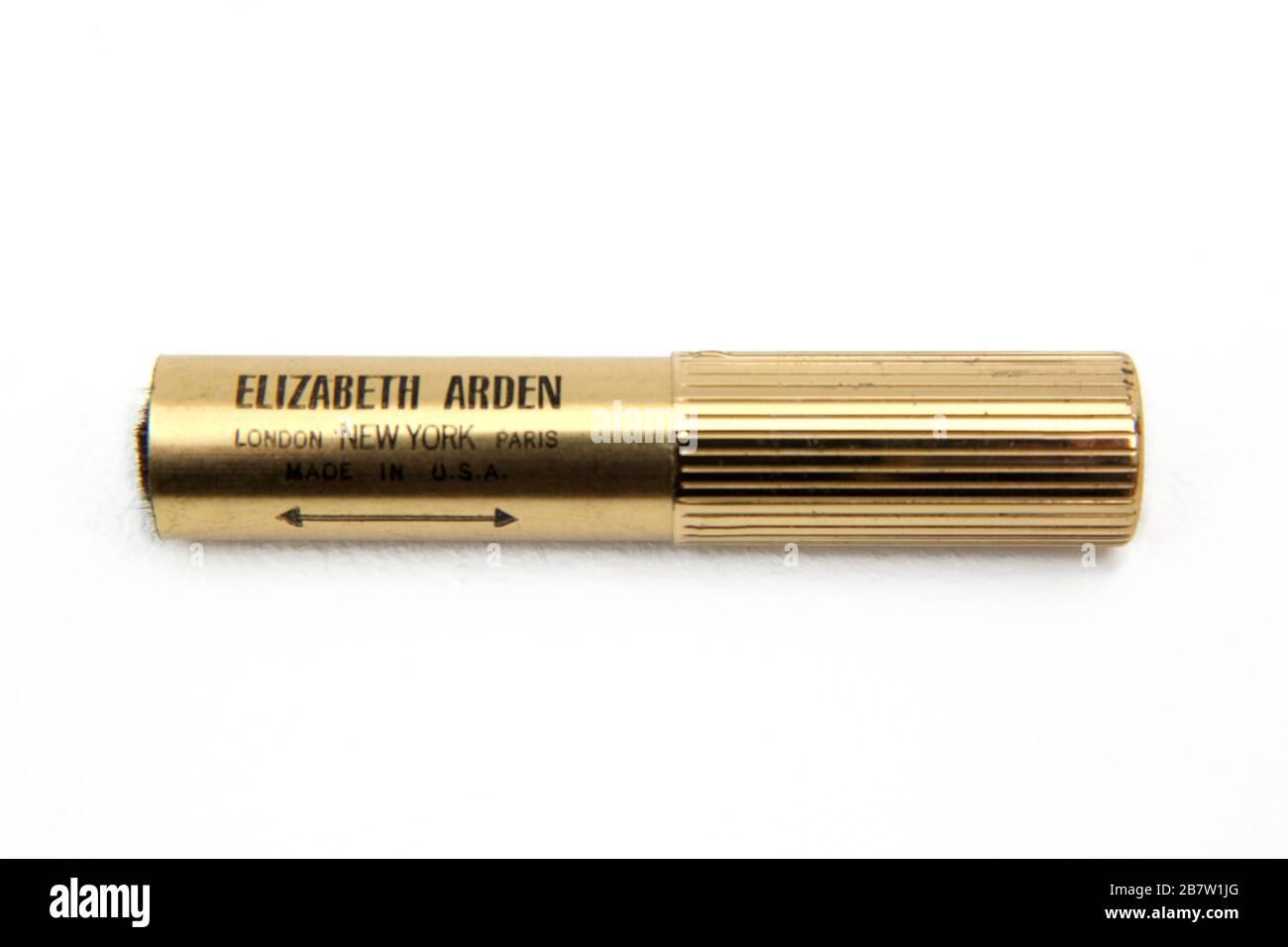 Cepillo cosmético retráctil Elizabeth Arden bañado en oro vintage Foto de stock