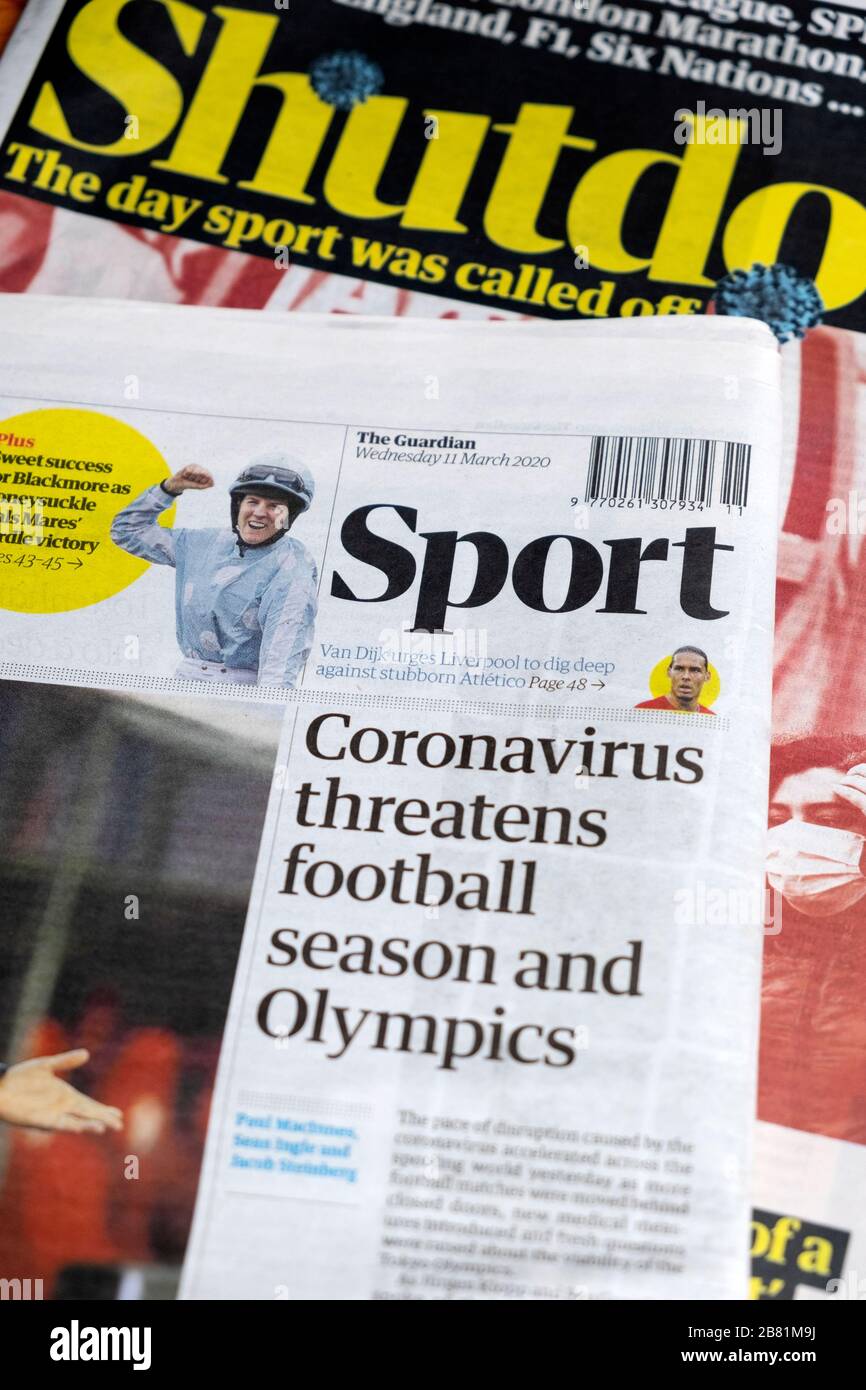 Cierre Sección de Deporte cierre "Coronavirus amenaza temporada de fútbol y Olimpiadas" en los periódicos Guardian marzo 2020 Londres Inglaterra Reino Unido Foto de stock