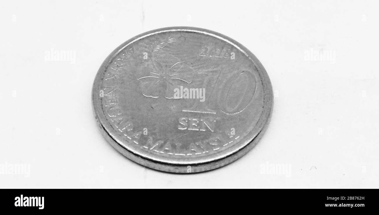 Una imagen de moneda con fondo blanco Foto de stock