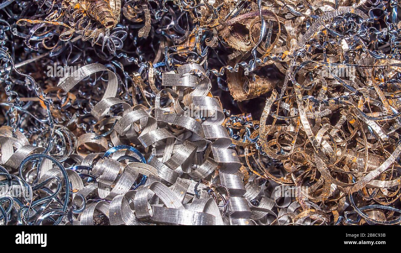 Fondo metálico. Virutas de color. Fondo de pantalla o protector de pantalla de chips metálicos abstracto de color de virutas de metal. Procesamiento de ferr Fotografía de stock - Alamy Fondo metálico. Virutas de color. Fondo de pantalla o protector de pantalla de chips metálicos abstracto de color de virutas de metal. Procesamiento de ferr Fotografía de stock - Alamy