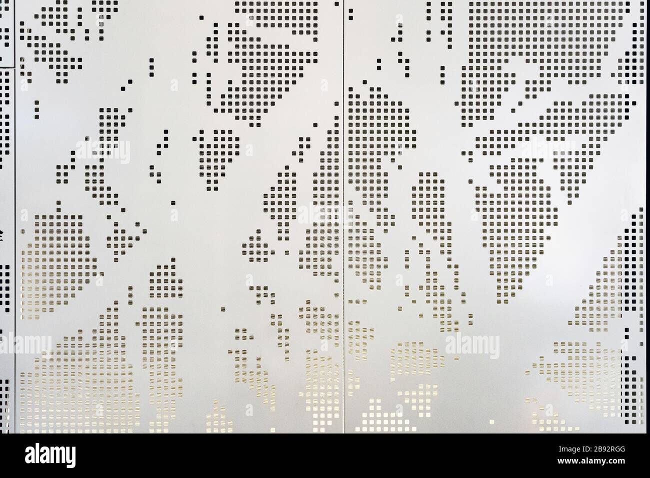 Panel de metal perforado blanco con patrón cuadrado abstracto. Arquitectura  Revestimiento de fachada con diseño paramétrico e iluminación desde atrás  Fotografía de stock - Alamy