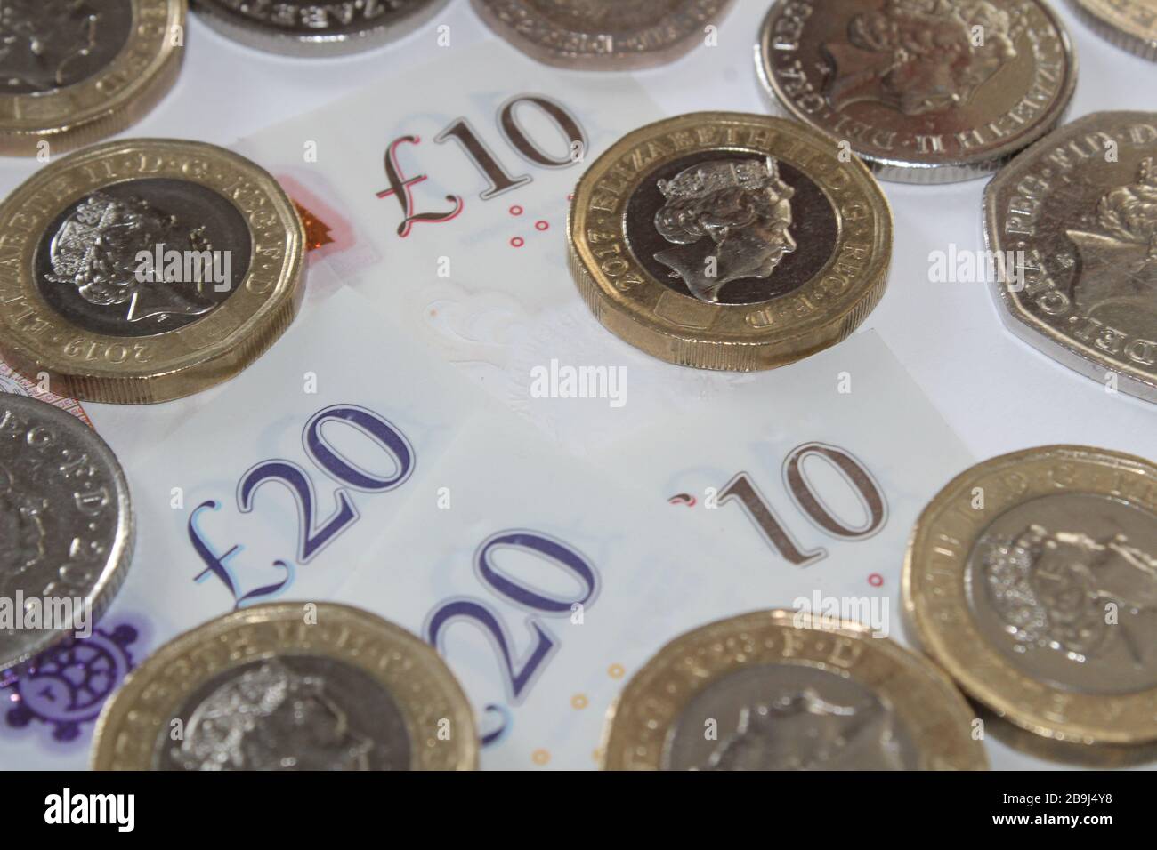 Moneda británica Monedas de libras billetes de 1 y 10 libras, 10 libras, billetes de 20 libras, 20 libras esterlinas Foto de stock