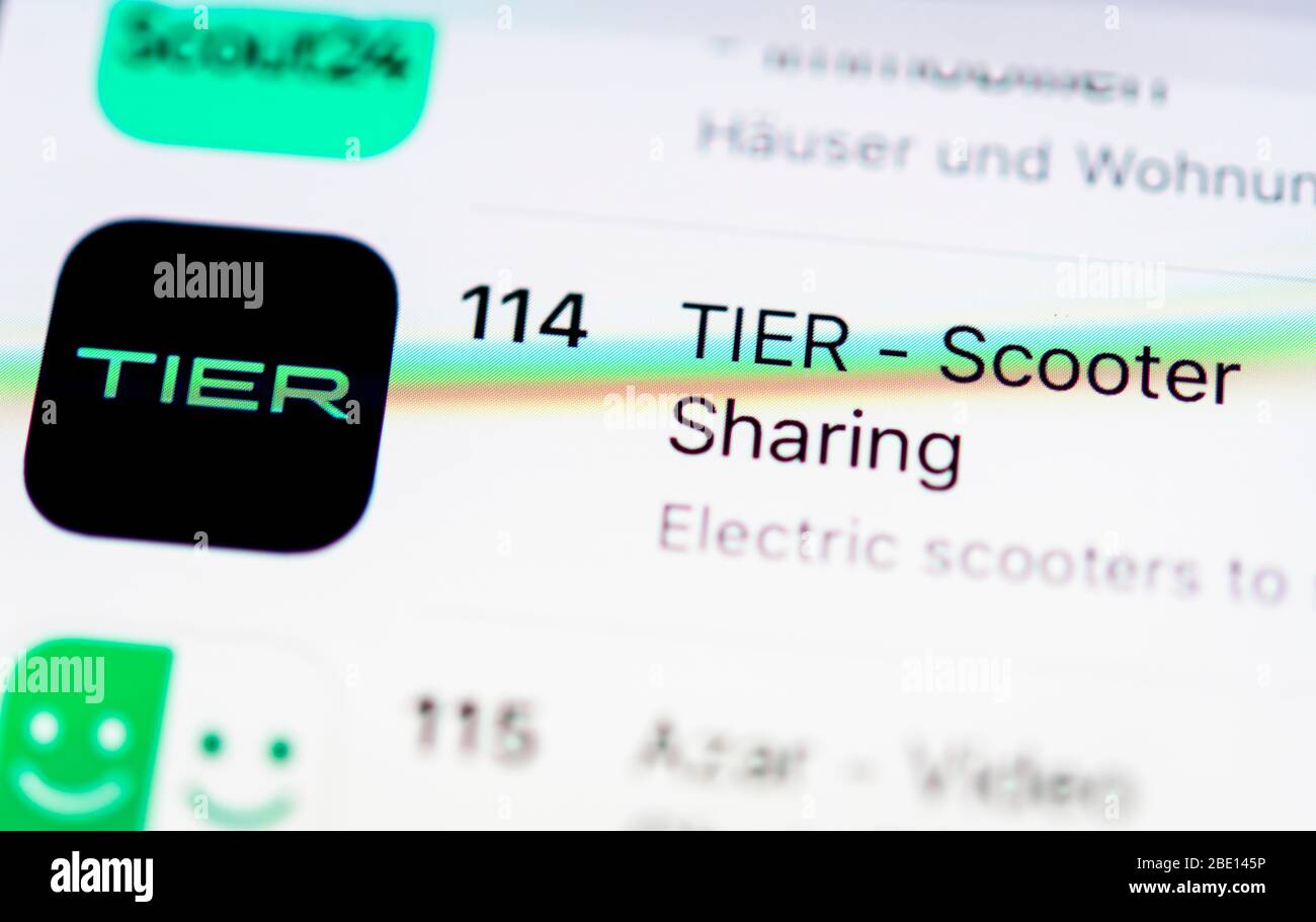Aplicación TIER-Scooter, servicio de uso compartido de scooters, icono de aplicación, pantalla en el teléfono móvil, smartphone, detalles, relleno de formato Foto de stock