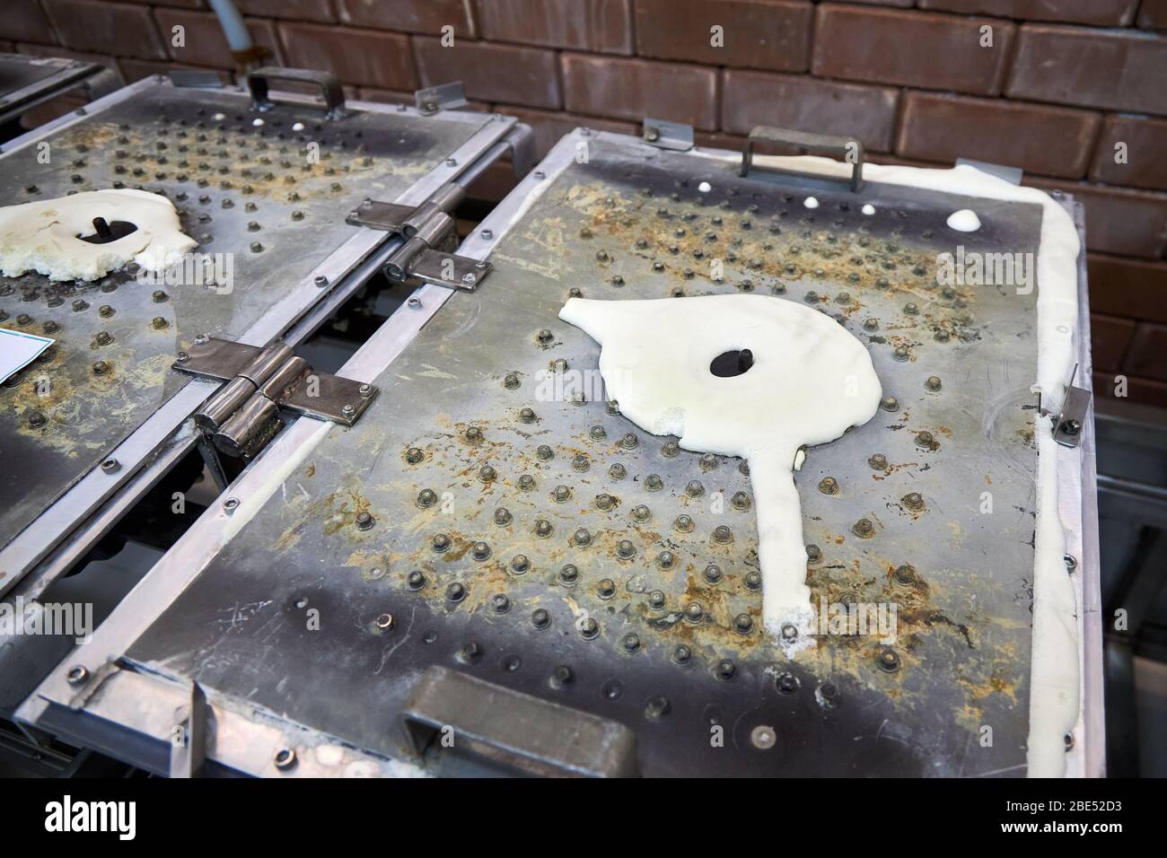 Molde metálico de almohadilla de látex caucho, primeros planos Fotografía de stock - Alamy
