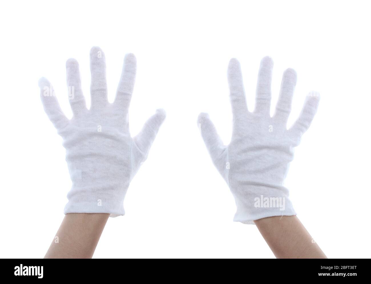 Guantes blancos de algodón sobre la mano de mujer Fotografía de stock -  Alamy