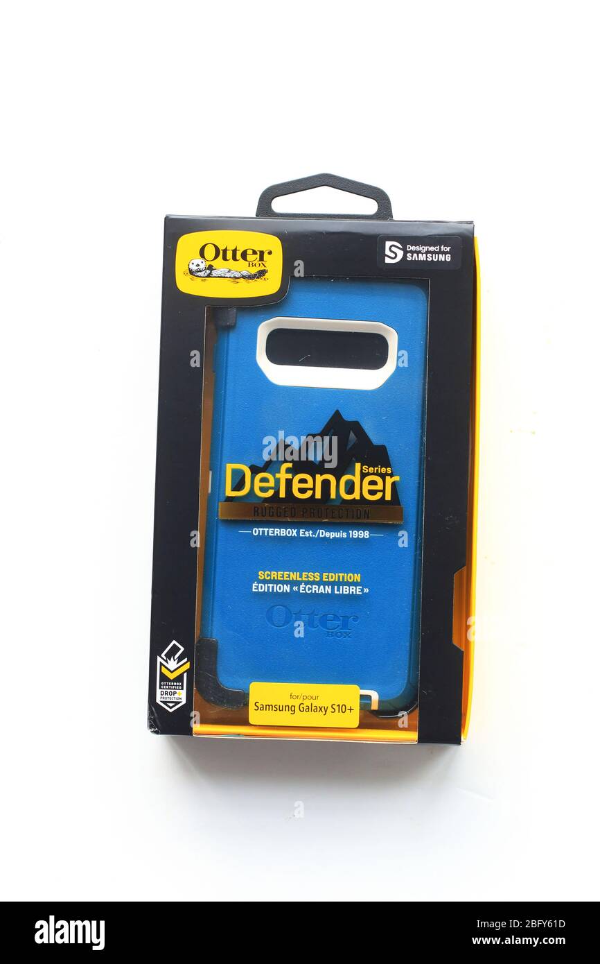 Protector de teléfono móvil OtterBox Defender para Samsung Galaxy S10+ aislado contra fondo blanco Foto de stock